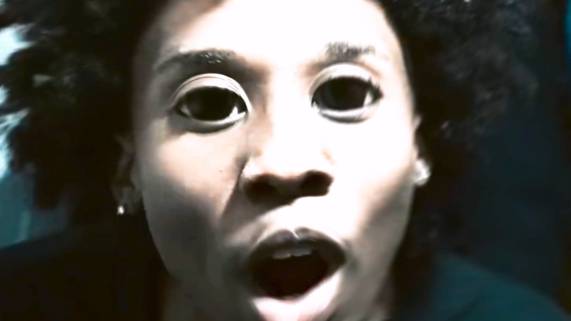 Close-up of a face with a digitally altered eye effect, a visual effects example from Lossvisuals post-production